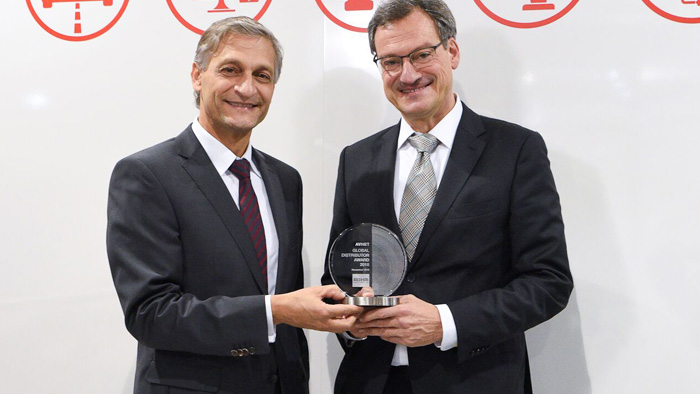 Mario Orlandi accepts ROHM Distributor of the Year Award