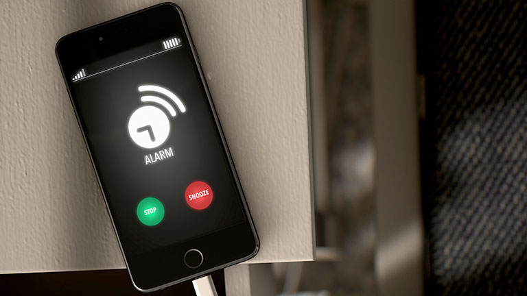 smartphone showing alarm feature