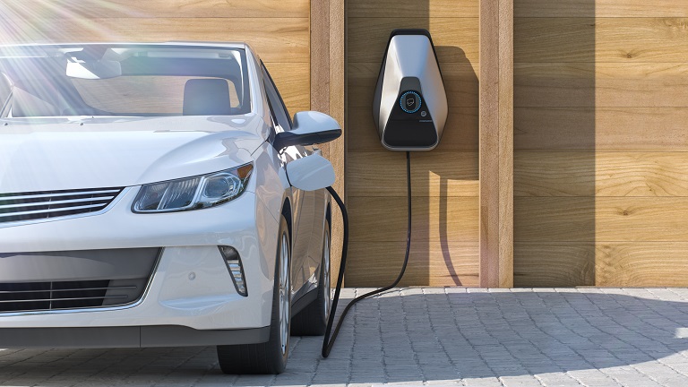 Vehicle attached to an electric charger