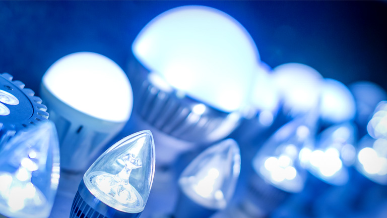 Different types of light bulbs lit up